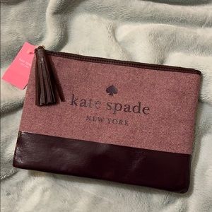 Brand new Kate Spade large tassel pouch